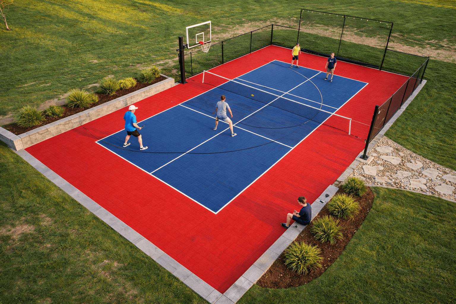 Backyard multi-sport court at sunset