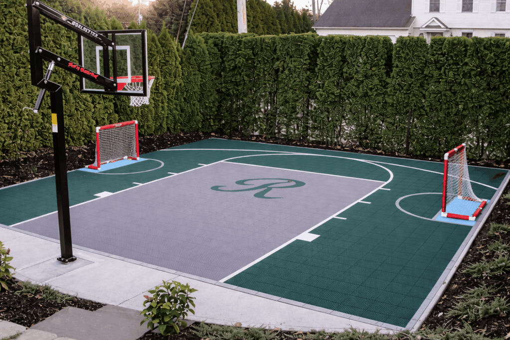Backyard sports court at dusk
