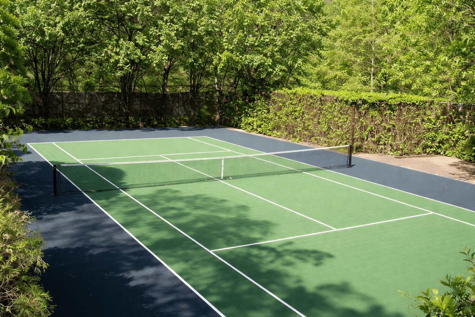 Private tennis court in vibrant afternoon light