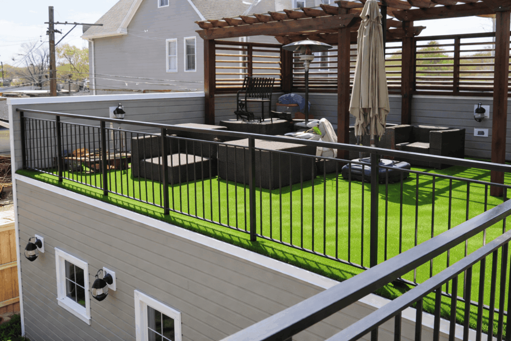 Urban rooftop terrace garden with dining area